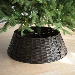 Detailed view of a dark brown plastic rattan Christmas tree collar skirt base basket decor.