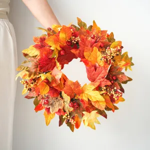 Autumn maple leaf wreath with vibrant berries, perfect harvest festival and holiday home decor.