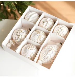 White and gold Christmas tree baubles set, vintage style decorative ornaments for holiday.