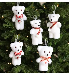 White polar bear Christmas tree hanging ornaments with red plaid scarves and bows.