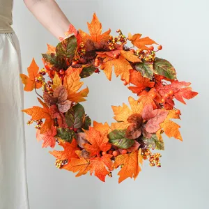 Autumn artificial maple leaf wreath for front door hanging and fall home wall decor.