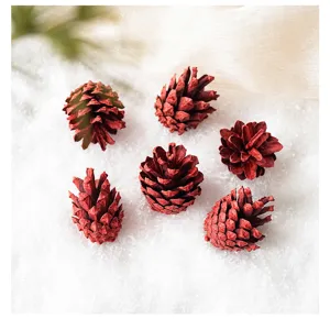 Red painted pinecones Christmas tree decoration natural pine cones holiday DIY crafts decor.
