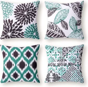 Set of 4 decorative pillow covers with modern abstract floral and geometric leaf prints for sofa.