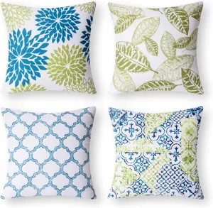 Decorative throw pillow covers set with blue and green botanical and geometric patterns.