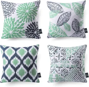 Set of 4 decorative throw pillow covers with modern abstract botanical and geometric prints.