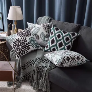 Decorative throw pillow covers with geometric and abstract floral prints for sofa decor