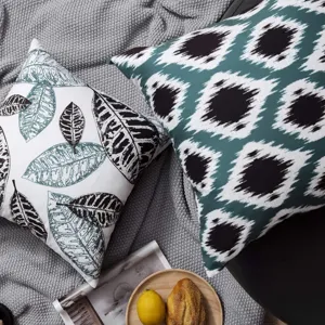 Decorative throw pillow cover set, modern abstract leaf and geometric print for sofa home decor.