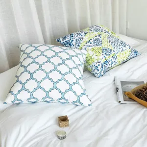 Minimalist geometric printed throw pillow cover, soft peach skin fabric sofa cushion case detail.