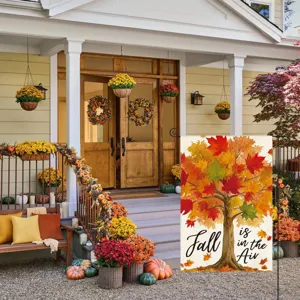 Autumn garden flag featuring a vibrant watercolor maple tree design for outdoor porch decor.