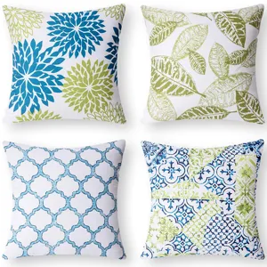 Set of 4 decorative throw pillow covers with abstract floral and geometric blue green patterns
