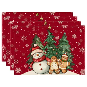 Christmas placemats set with cute snowman and gingerbread men pattern for holiday dining table.