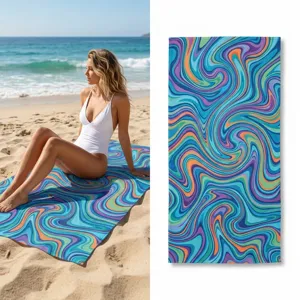 Detail view of a colorful psychedelic swirl beach towel, quick-drying microfiber fabric.