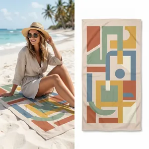 Geometric print beach towel, quick-dry microfiber material, stylish summer outdoor essential.