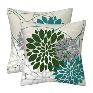 Detail view of modern geometric floral throw pillow covers, abstract leaf pattern home decor.