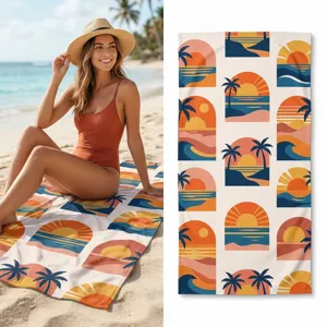 Detailed view of the retro sunset palm tree beach towel featuring vibrant summer beach patterns.
