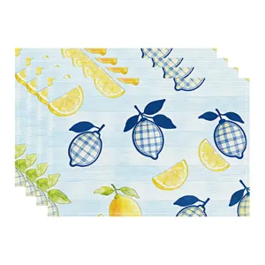 Waterproof linen placemat set featuring blue plaid and yellow lemon watercolor print for summer dining.