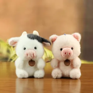 Cute plush animal toy pendant pair, soft stuffed cow and pig keychain bag ornament.