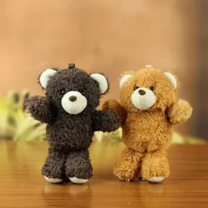 Plush bear pendant detail view, cute stuffed animal keychain and bag charm accessory.