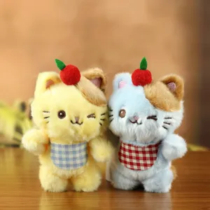 Cute cat plush toy pendant, soft kitten doll with lovely bib and cherry decor for bags and gifts.