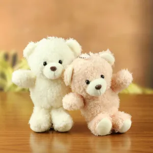 Cute plush bear keychain detail, soft stuffed animal doll pendant for bags and keys.