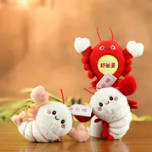 Cute plush lobster keychain doll pendant, soft stuffed animal bag charm for kids and girls.