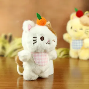 Cute white cat plush toy pendant with orange hat and pink plaid bib, soft keychain doll gift.