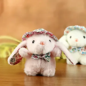 Portachiavi in peluche con coniglietto e cappello floreale, bambola morbida per borse.