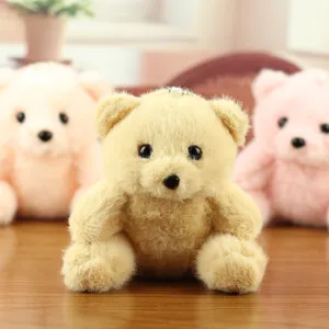 Leuke mini teddybeer pluche sleutelhanger, zachte textuur, gedetailleerd tasaccessoire.