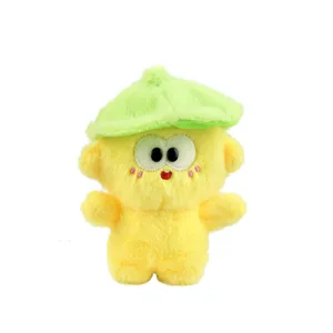 Mignon pendentif poupée singe en peluche jaune avec chapeau feuille de lotus verte, porte-clés.