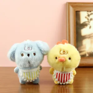 Cute plush toy detail shot showing soft fabric, stitching, and lovely striped bib design.