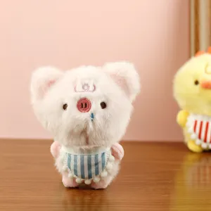 Cute pink plush bear doll wearing a blue and white striped bib, soft stuffed toy gift.