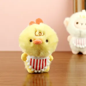 Cute yellow chick plush toy with a red striped bib, soft stuffed animal doll for gifts.