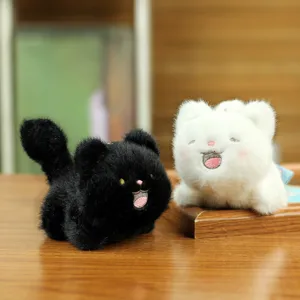 Cute plush cat keychain plushie pendant pair, soft stuffed animal bag charm toy gift for kids.
