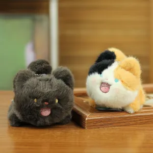 Cute plush cat keychain set, detailed close-up showing soft fluffy fur and sweet embroidered face.