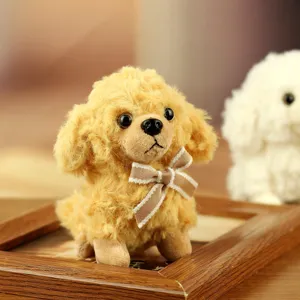 Cute teddy dog plush pendant toy detail view, fluffy yellow poodle keychain with bow tie.