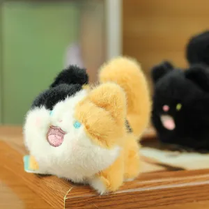 Close-up of cute calico plush cat toy detail, fluffy texture, perfect bag charm pendant.