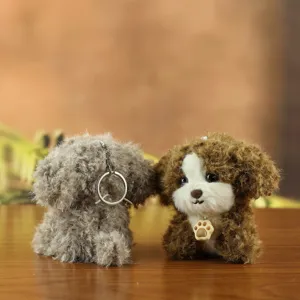 Cute fluffy puppy plush toy keychain with adorable paw charm, soft stuffed animal bag pendant.