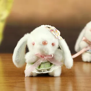 Cute plush rabbit pendant detailed view, featuring a lovely lolita dress and soft furry texture.
