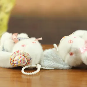 Cute white rabbit plush keychain with straw hat and gauze skirt, soft fluffy toy pendant bag charm.