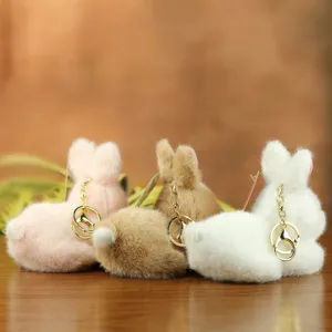 Cute fluffy rabbit plush keychain charm simulation bunny doll for bags keys and gifts.