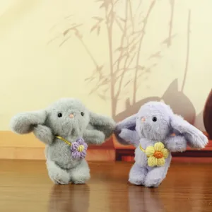 Cute plush bunny keychain pendant, soft stuffed animal toy bag hanging ornament for girls.