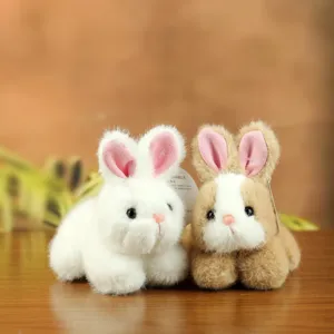 Cute plush rabbit toy simulation bunny doll soft stuffed animal decoration gift for kids.