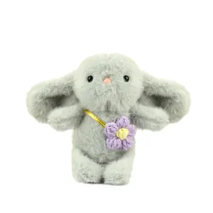 Cute grey long-eared plush rabbit doll pendant with a purple knitted flower cross-body bag