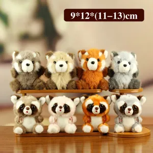 Cute plush red panda raccoon toy detail shot, soft stuffed animal doll display on wood shelf.