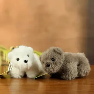 Cute polar bear plush toy keychain, soft stuffed doll pendant for cute bag decoration.