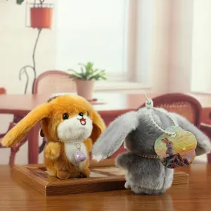 Cute plush rabbit pendant with necklace, fluffy big ear bunny toy for gifts or bag decor.