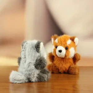 Cute plush red panda and raccoon toy keychains, soft fluffy animal doll pendants for bags.