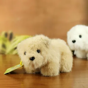 Cute brown plush bear plushie pendant toy, soft fluffy stuffed doll detail view.