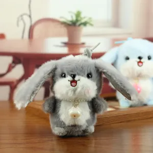 Cute grey rabbit plush pendant with pearl necklace, soft big-eared bunny toy for bag decor.