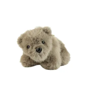 Cute plush bear toy, soft stuffed animal in a lying pose, perfect cozy companion gift.